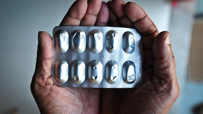A patient in Indore shows the medication he was given during a drug trial in India, one of those subject to a complaint to the country’s Supreme Court. Gethin Chamberlain for The National