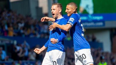 epa07519745 Everton's Gylfi Sigurosson (L) is congratulated by Richarlison (R) after scoring the second goal during the English Premier League soccer match between Everton and Manchester United held at Goodison Park in Liverpool, Britain, 21 April 2019. EPA/PETER POWELL EDITORIAL USE ONLY. No use with unauthorized audio, video, data, fixture lists, club/league logos or 'live' services. Online in-match use limited to 120 images, no video emulation. No use in betting, games or single club/league/player publications
