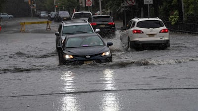 Cars on a flooded street in Hoboken, New Jersey.