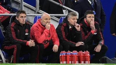 Solskjaer, second right, watches from the dugout. Reuters