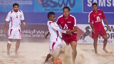 Adel Ali Rahu Ranjbar, left, of the UAE challenges a Tahiti player as the hosts kicked off their Intercontinental Cup campaign in Dubai with a 3-2 win over Tahiti.