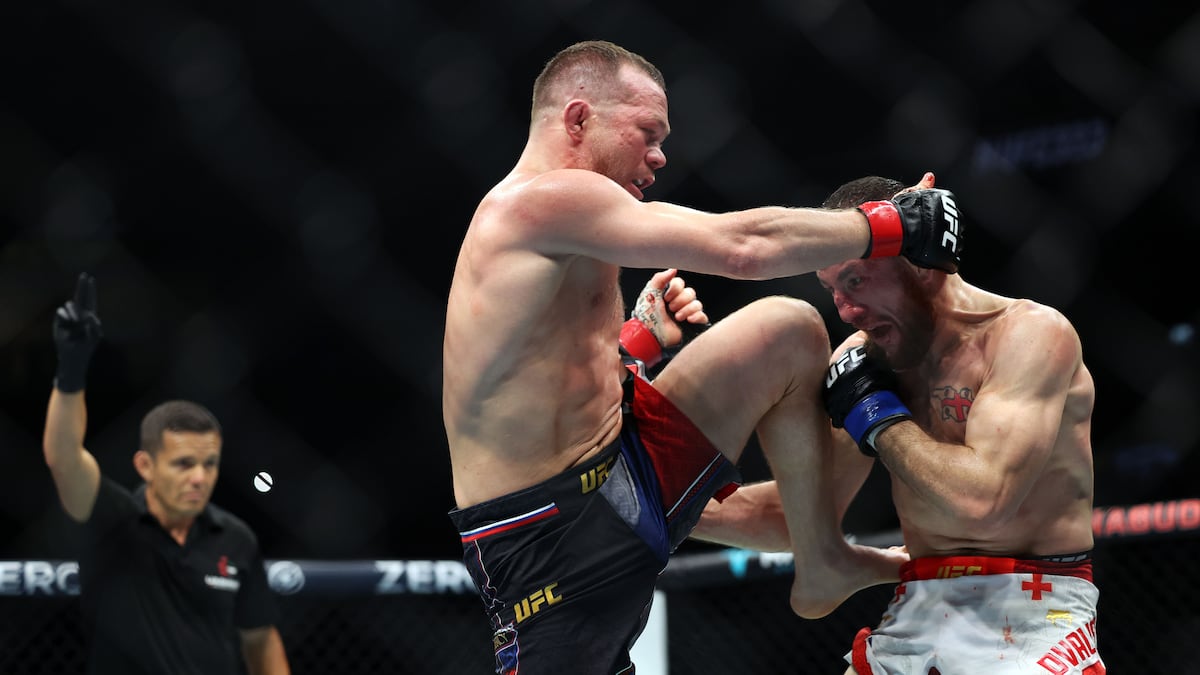 Petr Yan lands a knee against Merab Dvalishvili at UFC 333