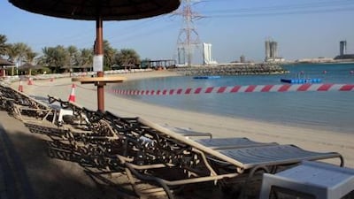 Swimmers at The Club have been banned from the sea because of a sewage problem off Abu Dhabi island.
