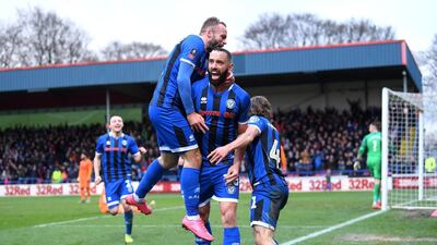 Aaron Wilbraham of Rochdale celebrates with teammates after scoring his team's first goal during the FA Cup third round match against Newcastle United at Spotland Stadium in January. Getty Images