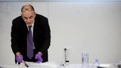 Bertrand Lavedrine a professor at the Museum National d' Histore Naturelle in Paris leads a discussion on the scientific principles of image formation and structure in silver. Sammy Dallal / The National