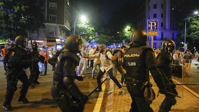 Police and protesters clash in Madrid, Spain, after a demonstration against the government of Prime Minister Pedro Sanchez. EPA