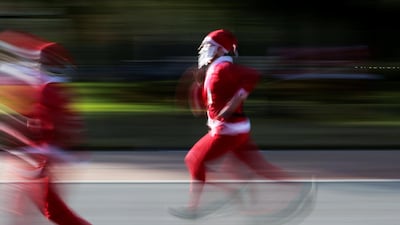 Participants dressed as Santa Claus take part in the annual race known as 'Run Santa Run' at Fundidora Park in Monterrey, Mexico. Reuters