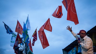 Presidential candidate Emmanuel Ramazany Shadary greets a crowd of supporters during his election rally in Goma, North-Kivu. AFP