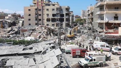 Rescuers at the scene of an Israeli strike near a hospital in Tyre, Lebanon, on Tuesday. Reuters