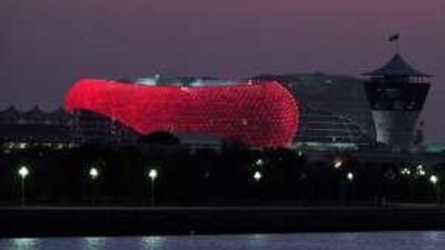 Coloured lights illuminate the Yas Hotel on the Formula One racetrack.