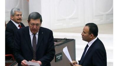 Deniz Bolukbasi, a politician from the opposition Nationalist Action Party, centre, says his party, the MHP, is the target of 'an AKP-sponsored assassination attempt aimed at the MHP's political existence'.