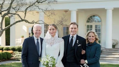 The happy couple is flanked by the president and the first lady. Photo: Corbin Gurkin