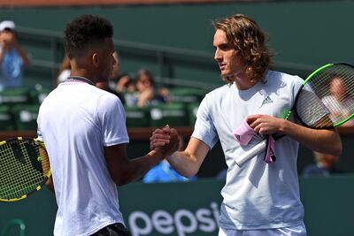 Felix Auger-Aliassime, left, was brilliant against rising star Stefanos Tsitsipas at Indian Wells on Sunday. Reuters