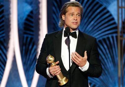 Brad Pitt accepts the award for Best Supporting Actor