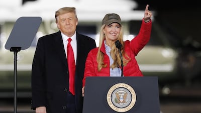 US President Donald Trump (L) and Republican US Senator from Georgia Kelly Loeffler (R) speak during a campaign rally in Dalton, Georgia, January 4, 2021. EPA/ERIK S. LESSER