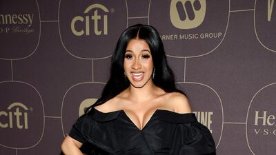 Rapper Cardi B opted for a resort 2018 Carolina Herrera dress for one of the many pre-Grammy parties she attended. Evan Agostini / AP