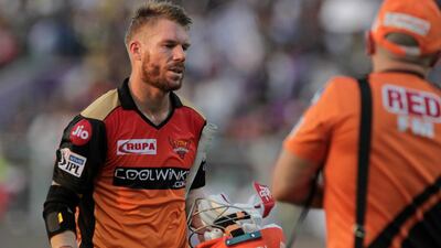 Sunrisers Hyderabad's David Warner walks back to pavilion after scoring 85 against Kolkata Knight Riders on Sunday. Bikas Das / AP Photo