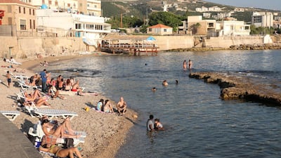 Beachgoers enjoy the sun in Batroun, a city with a population of about 45,000 in north Lebanon. Reuters