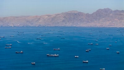 Vessels sailing through the Strait of Hormuz, as seen from Musandam, Oman, on Monday. The Iran war led oil prices to spike on supply concerns from the Middle East producers and the near closure of the strait. Reuters