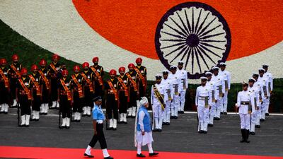 Mr Modi inspects the honour guard during the Independence Day celebrations at the fort. Reuters