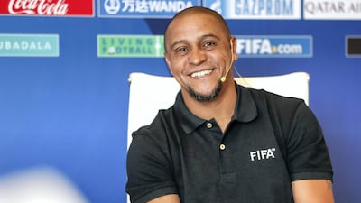 Former Real Madrid and Brazil defender Roberto Carlos speaking at a news conference at the Yas Hotel in Abu Dhabi to promote the Fifa Club World Cup. Victor Besa / The National