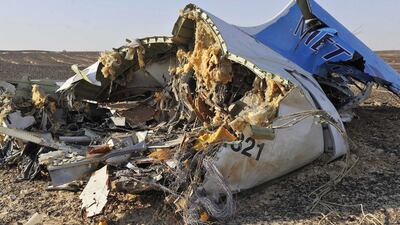 Debris from crashed the Russian jet lies strewn across the sand at the site of the crash in Sinai, Egypt. The Egyptian government dispatched more than 45 ambulances to the crash site after the jet disappeared from radar after requesting an emergency landing. The black box has been recovered at the site. EPA