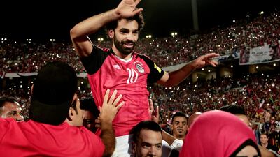 Egypt's Mohamed Salah celebrates after his two goals against Congo set up a 2-1 win and qualification for the 2018 World Cup. Nariman El-Mofty / AP Photo