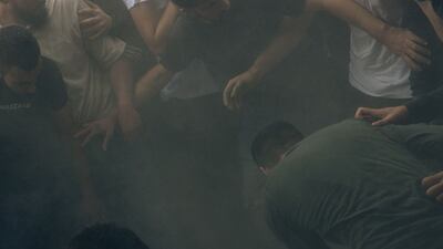 Maen Hammad took this image of a funeral procession in the West Bank commemorating a man shot by an IDF sniper. Courtesy the artist