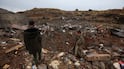Rubble and debris is scattered across the ground after strikes on Sanaa. EPA