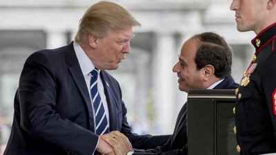 US president Donald Trump greets Egyptian president Abdel Fattah El Sisi as he arrives at the White House in Washington, DC on April 3, 2017. Andrew Harnik / AP Photo
