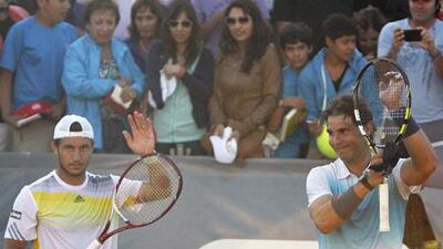 Juan Monaco and Rafael Nadal celebrate their victory over Frantisek Cermak and Lukas Dlouhy at the Chilean Open.