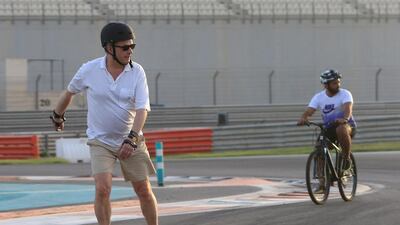 Sauli Niinisto, the president of Finland, goes rollerblading at Yas Marina Circuit on Sunday in Abu Dhabi, continuing his globetrotting tradition of diplomacy on wheels. Ravindranath K / The National