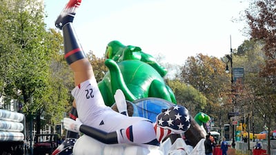 Handlers with balloon footballs will follow behind Striker's striking foot. AFP