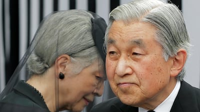 Emperor Akihito and Empress Michiko leave after praying at the altar of the late Prince Tomohito in Tokyo on June 19, 2012. Itsuo Inouye / AP Photo