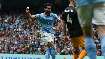 Manchester City's Ilkay Gundogan scores his side's second goal against Leeds. AP