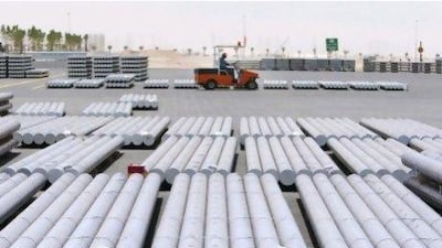 Aluminium bars ars stacked at the Emal smelter in Al Taweelah.