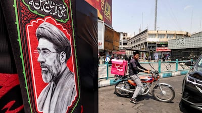 An image of Iran's supreme leader, Mojtaba Khamenei, is seen at Valiasr Square, central Tehran. AFP