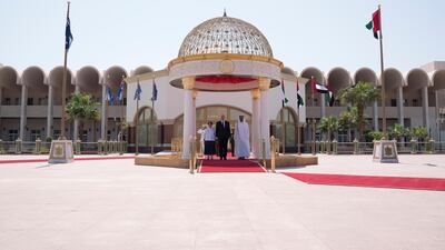 Sheikh Mohammed bin Zayed, Crown Prince of Abu Dhabi Deputy Supreme Commander of the UAE Armed Forces, right, receives General Sir Peter Cosgrove, Governor-General of Australia, centre, and Lady Cosgrove. left, at Mushrif Palace. Mohamed Al Hammadi / Crown Prince Court - Abu Dhabi
