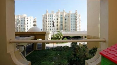 The balcony in the first-floor Shoreline apartment on Palm Jumeirah allows the family to enjoy some fresh air.