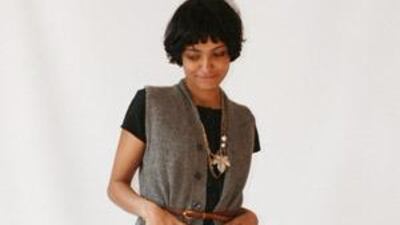 The Uniform Project's Sheena Matheiken in the dress she has pledged to wear daily for a year - complete with myriad add-ons.