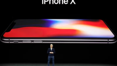 Apple CEO Tim Cook announces the new iPhone X at the Steve Jobs Theater on the new Apple campus. Marcio Jose Sanchez / AP Photo
