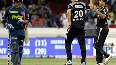 Sourav Ganguly, right, congratulates teammate Mitchell Marsh during his bowling spell against the Deccan Chargers.