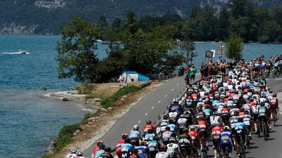 Cyclists in action next to Annecy Lake during the 10th stage of the Tour de France over 158,5km between Annecy and Le Grand-Bornand. Yoan Valat / EPA