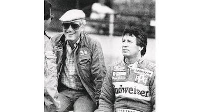 The American former Formula One champion Mario Andretti seen here in 1983 with Newman on the pit wall, was the team's first driver and first race winner. John C. Hillery / Reuters / AP / Mac