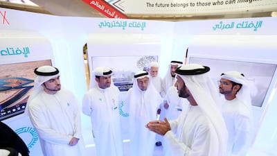 Dr Ahmad Al Haddad (C), Grand Mufti of Dubai and director of the fatwa department at the Islamic Affairs and Charitable Activities said Muslims can pay their Zakat this year by donating meals or food parcels to help those in need. Chris Whiteoak / The National.