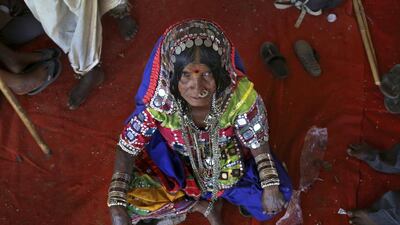 Ramavva Lamani, an indigenous Indian woman, joins a protest by parts of the Hindu community demanding equal rights in Bangalore. Aijaz Rahi / AP Photo