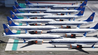 Grounded China Southern Airlines Boeing 737 MAX aircraft parked in a line at Urumqi airport, in China's western Xinjiiang region. AFP