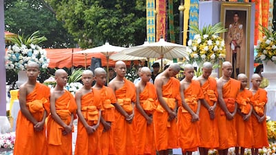 Members of the Thai football team pose for photographs after they were ordained as Buddhist novice monks or at Wat Phra That Doi Wao temple, Chiang Rai province, Thailand. EPA