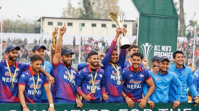 Nepal, champions of the ACC Men’s Premier Cup 2023, with the trophy after beating the UAE by seven wickets in the final at the Tribhuvan University International Cricket Ground in Kathmandu on May 2, 2023. Photo: Asian Cricket Council