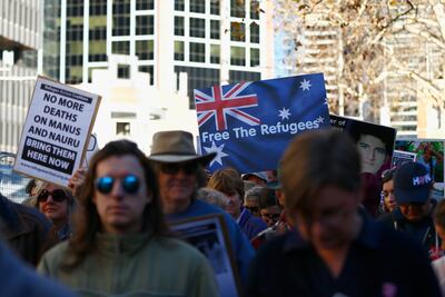 Demonstrations are seen during the 'Evacuate Manus and Nauru Protest at Town Hall in Sydney in July 2018. EPA